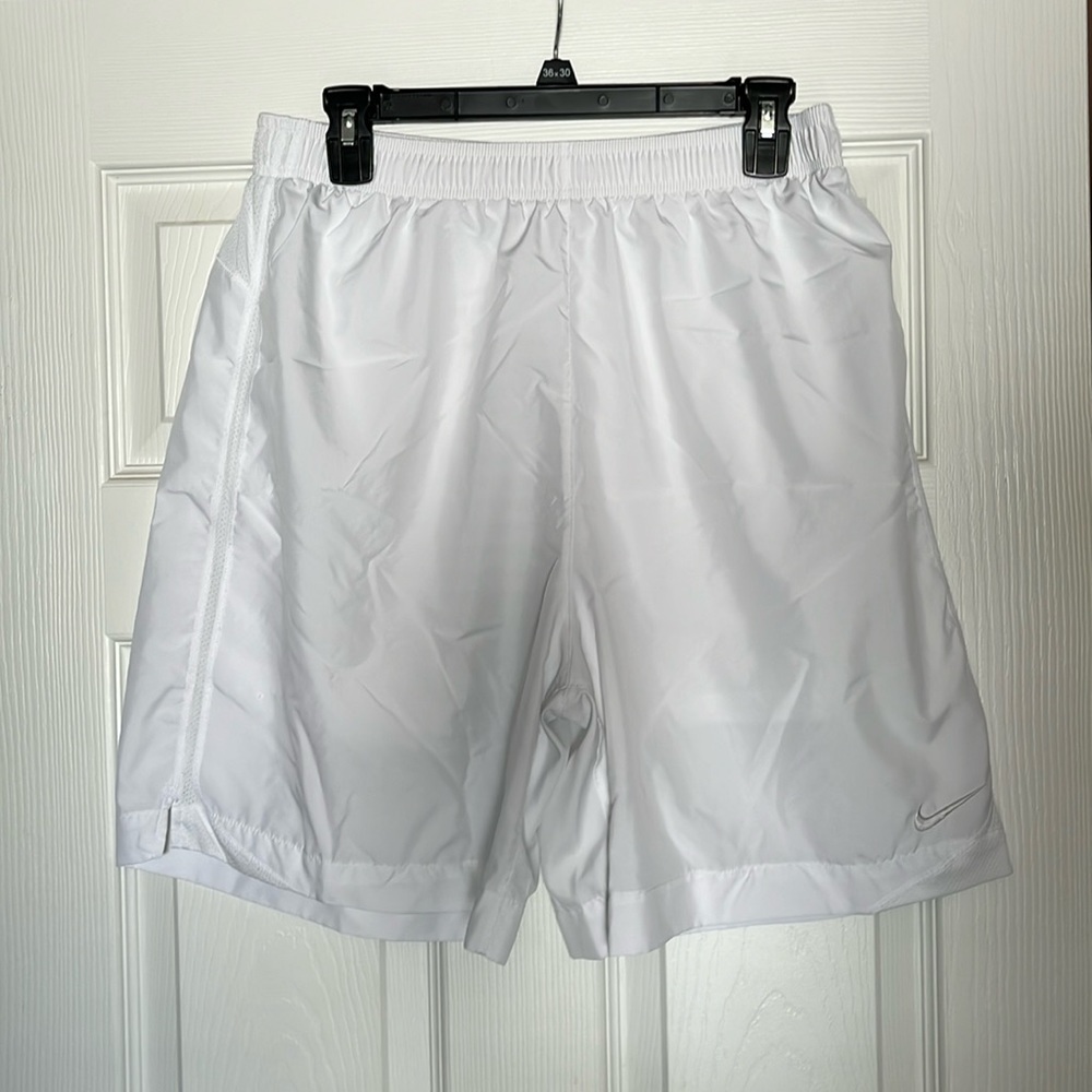 Nike size L white dry fit shorts / below knee style